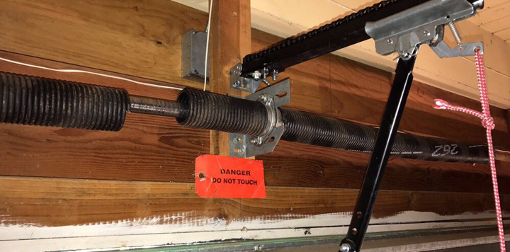 Garage door spring repair Genesee County